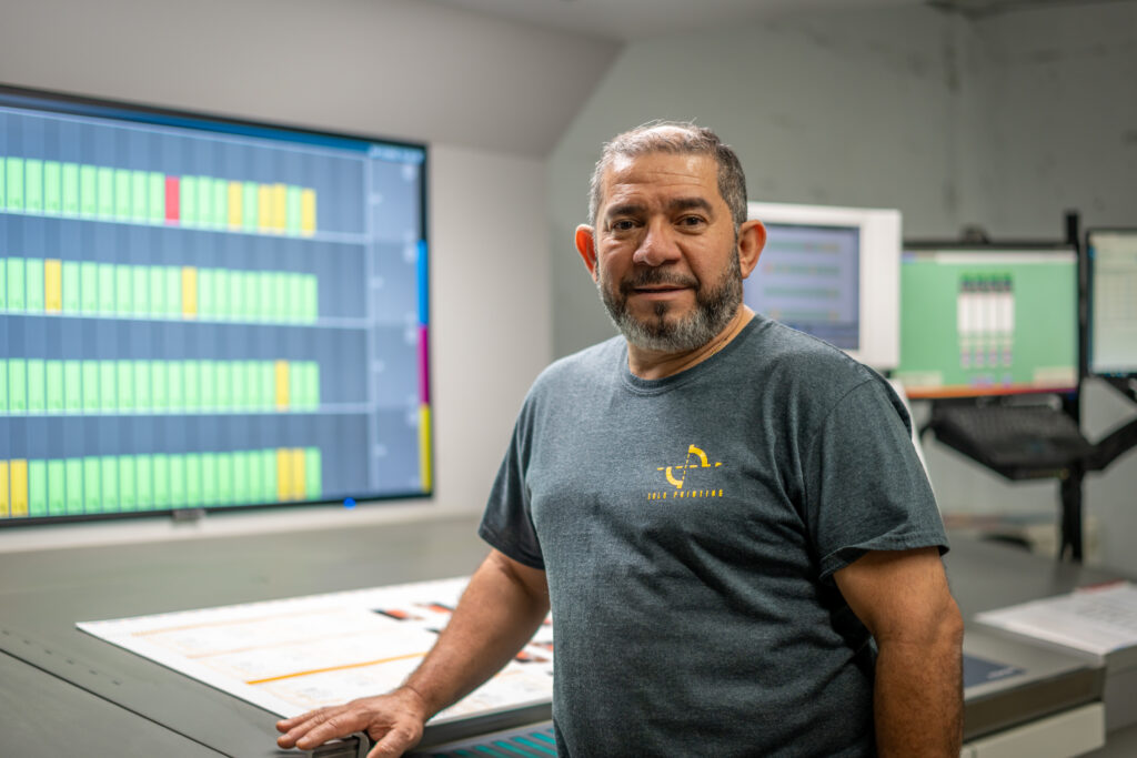 Solo Printing team member at bindery