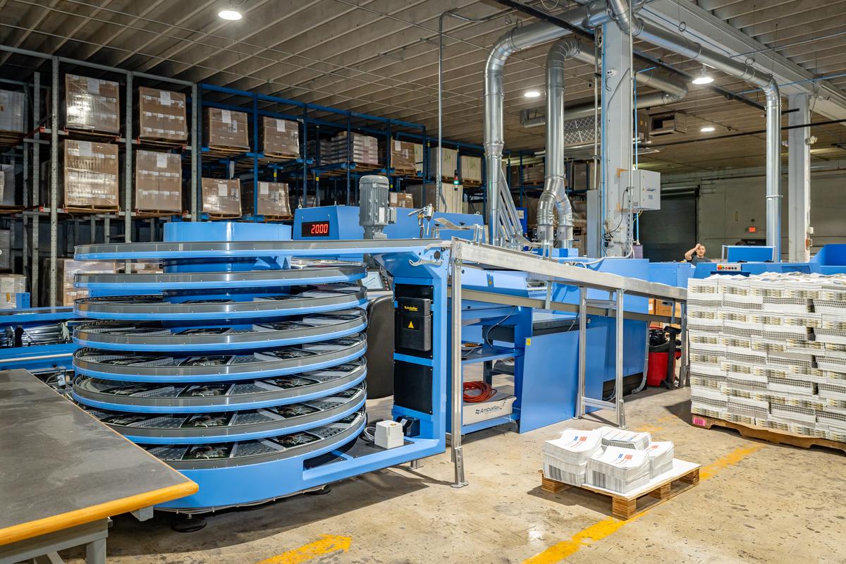 Bindery cooling and collating line at Solo Printing in Miami