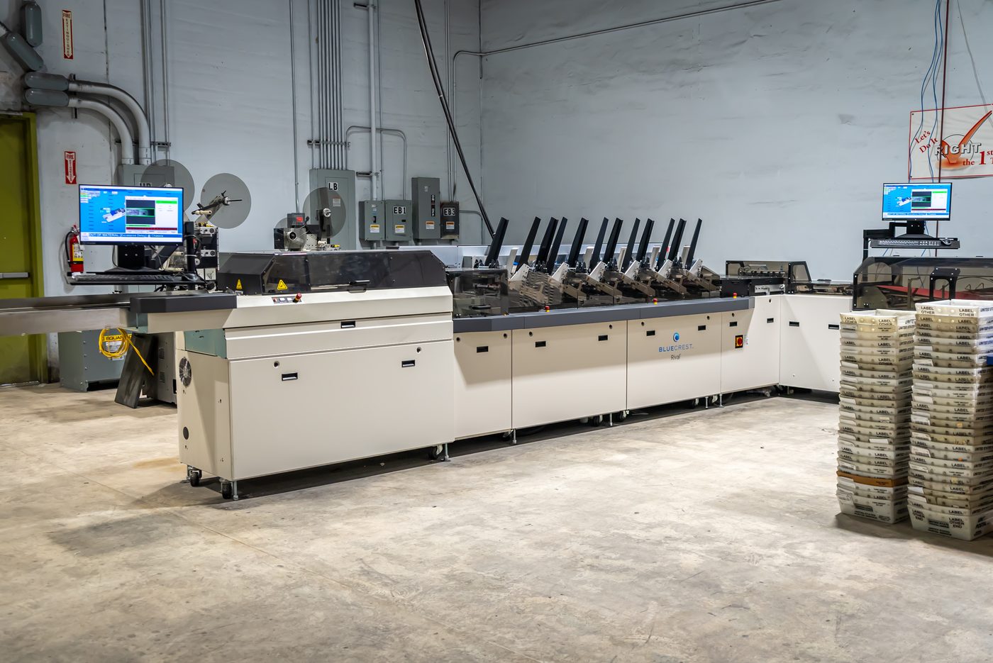 Solo Printing team member packing finished work in the mailing and fulfillment department in Miami